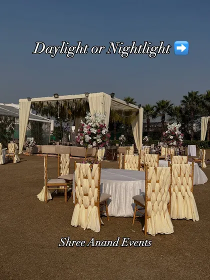 A daytime view of an outdoor seating arrangement, with elegantly woven chair covers and a simple, sophisticated mandap.