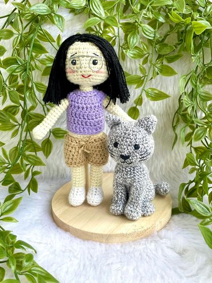 Another beautiful replica of a girl and her cat. I love how the purple top and shorts came out. These custom dolls make such personal and cherished gifts for any occasion.