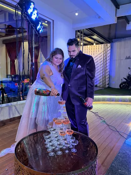 A champagne tower is the epitome of celebration. We love helping couples create iconic moments like this, whether it's for a wedding reception, engagement party, or a milestone anniversary.