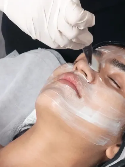 A close-up of a deep cleansing facial treatment. I focus on targeting problem areas with precision to ensure your skin feels refreshed and thoroughly clean.