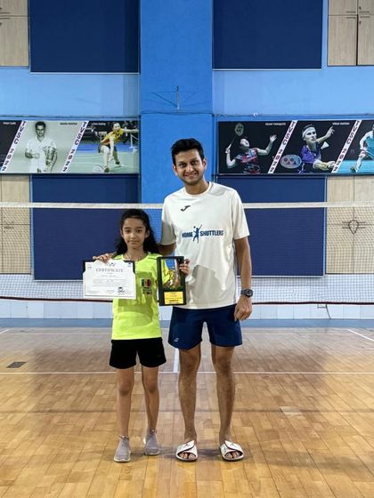 Nitika Gautam, runner-up in a Mumbai suburban district tournament, with her coach. We teach our players that every match, win or lose, is a learning opportunity.