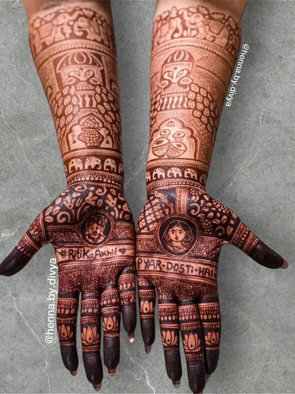 This rich henna stain highlights personalized text, including the couple's names "Ritika" and "Ankit" and the phrase "Pyar Dosti Hai".