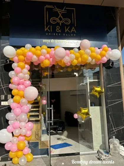 I provide cheerful and inviting decor for new business openings. This balloon arch for the Ki & Ka Unisex Salon uses a bright pink, yellow, and white color scheme to attract attention and celebrate their launch.