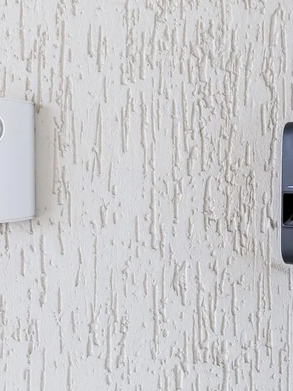 This installation showcases the integration of an audio-video communication unit with a biometric fingerprint scanner. This combination allows for two-factor verification, providing an exceptionally high level of security for sensitive areas.