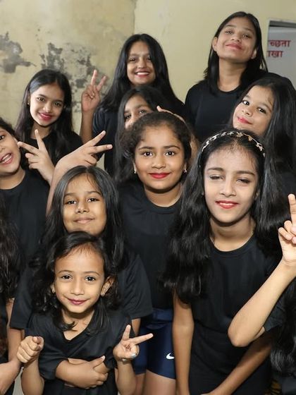 A happy group of our young dancers backstage, ready to go on stage and shine.
