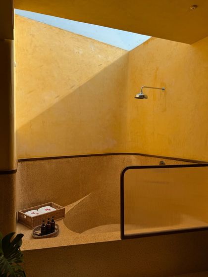 The unique sunken shower with an open skylight, allowing you to bathe under the open sky in complete privacy.