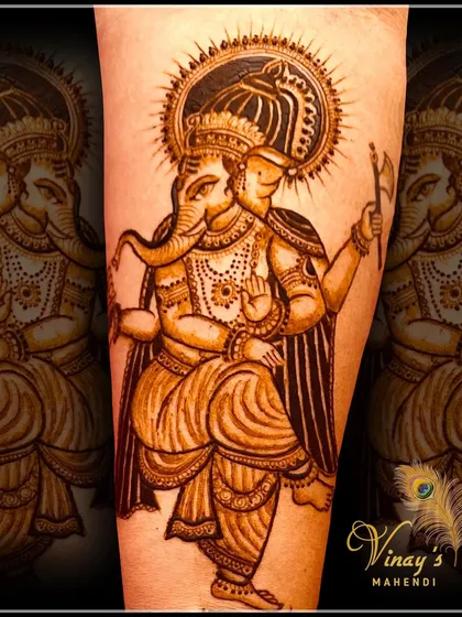 This depiction of Lord Ganesha holding an axe symbolizes the power to remove obstacles. We study the meaning behind different postures and symbols to create more meaningful art.