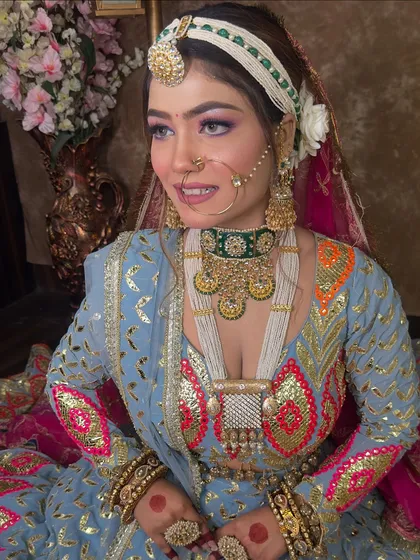 A happy bride-to-be in my colorful blue lehenga. I love helping my clients find outfits that match their personality and make them smile.