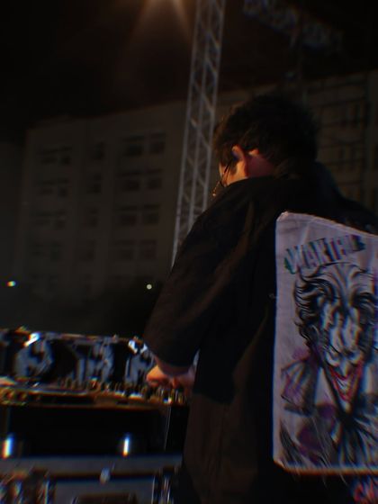 A behind the back view showing the custom jacket art and the DJ console. My personal style is an extension of my brand and the music I represent.