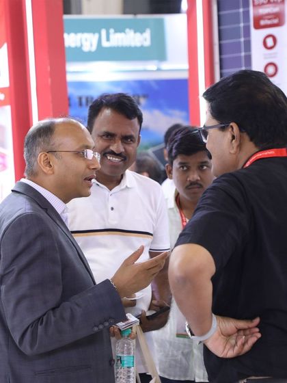 Our director engaging with industry peers and partners on Day 1 of the REI Expo, sharing our vision for the future of solar.