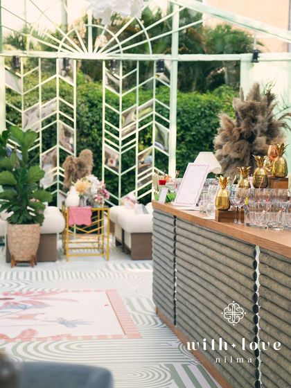 The custom bar at 'The Conservatory' baby shower, a stylish and functional centerpiece for the event.