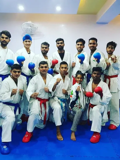 A group of our dedicated athletes at the dojo. We foster a strong team environment where both male and female players train together to achieve their personal best.