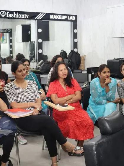 A live demonstration during a makeup class. Our instructors provide step-by-step guidance, and students get to observe techniques up close before practicing themselves.