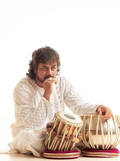 A pensive look during my photoshoot. Music is a deeply reflective art form, and this image captures that introspective side of my personality as an artist.