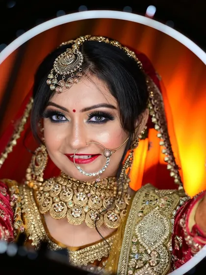 A creative ring-light portrait that frames the bride's face perfectly. This technique adds a modern touch to traditional bridal photography.