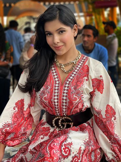 This look is all about casual glam for a day out. The makeup is polished but not overpowering, perfectly suiting this printed Indo-western dress and statement belt for a stylish brunch or event.