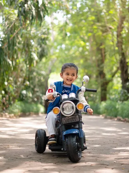 Capturing the "too cool for two" attitude with this fun biker theme. Outdoor shoots like this let your toddler's personality shine as they explore, play, and show off their adventurous side.