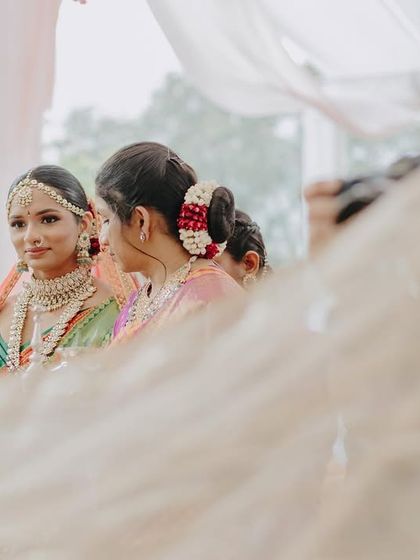 A glimpse of the bride during the ceremony. The focus is on her expressive eyes, which we accentuated with a classic liner and subtle shadow.