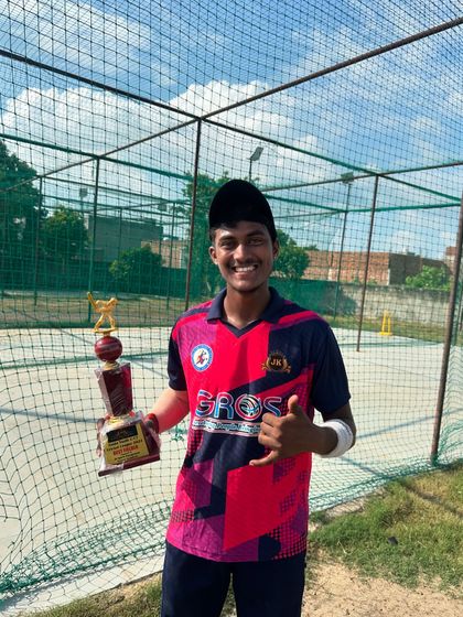 Celebrating Mayan Sharma's match-winning innings of 158 not out. This trophy is a reward for his relentless hard work and discipline in training.