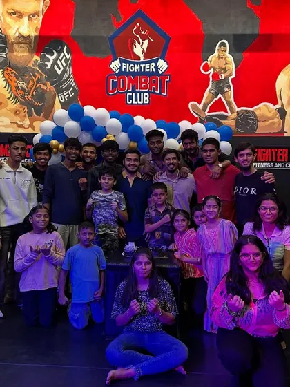Another shot of our family celebration. The balloons and smiles show the joy we share in each other's success. This is what community looks like.