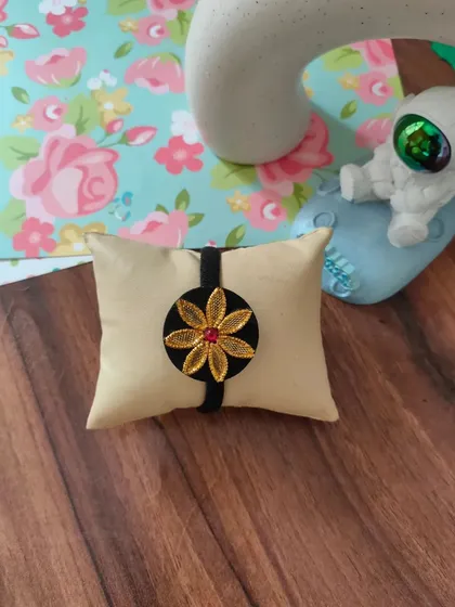My collection of decorative elastic hair bands. Each one features a unique handmade centerpiece, including gotapatti, Kundan work, zardozi, and bead embroidery.