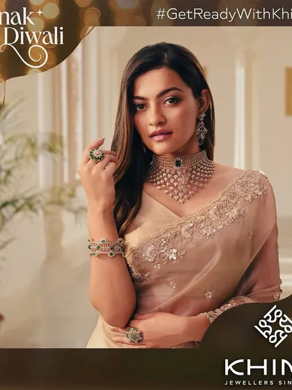 Soft glam for Prakruti Mishra for the Khimji Jewellers Diwali campaign. The makeup features a subtle smokey eye and a nude-pink lip, allowing the stunning diamond and emerald choker to take center stage.