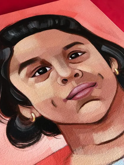 A closer look at the details in Jiza's acrylic portrait. Notice the subtle shifts in color on the skin and the highlights in her hair, all painted by hand on canvas.