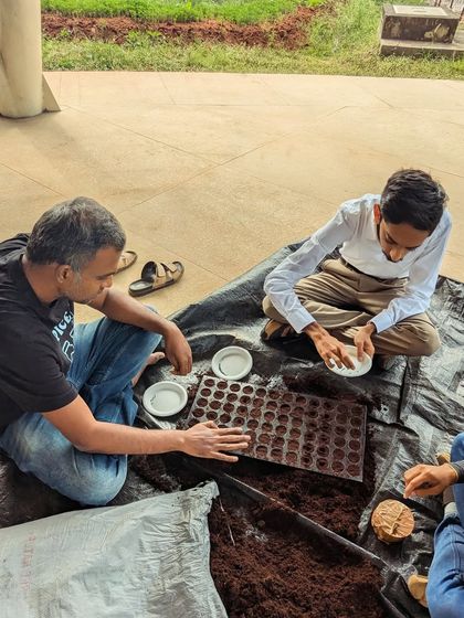 Precision and care are key. Our trainees get hands on experience filling seedling trays, learning the correct techniques for optimal germination and growth.