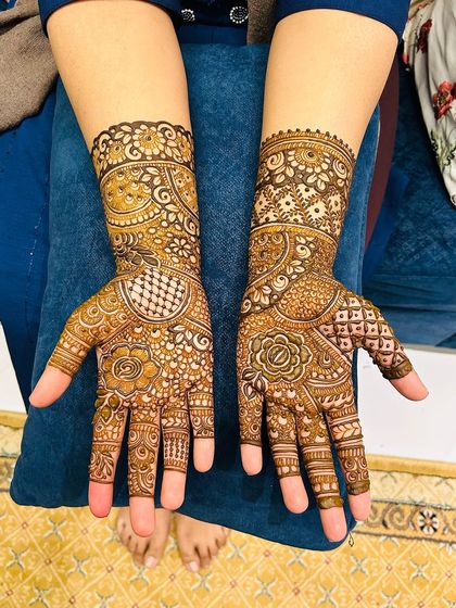 A beautiful design for a client, with intricate patterns covering the hands and forearms.