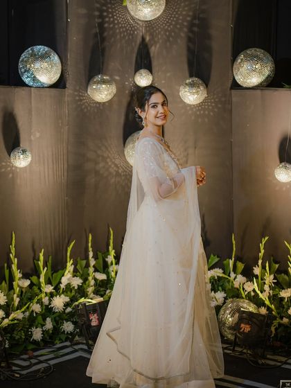A poised and elegant shot, looking back at the camera. This shows my ability to deliver both candid and classic model poses.