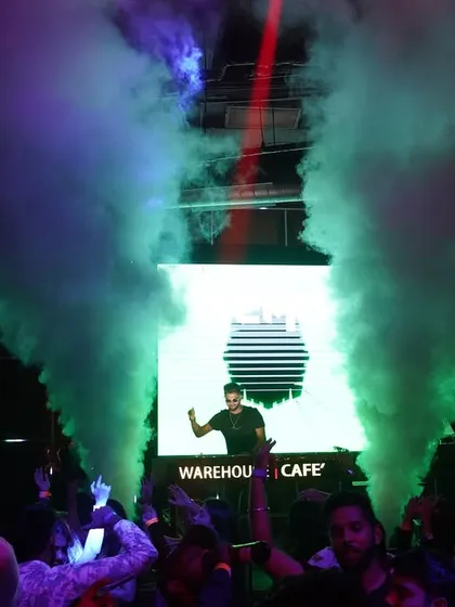 Framed by two massive CO2 jets at Warehouse Cafe. This symmetrical shot highlights the impressive production value of my shows.