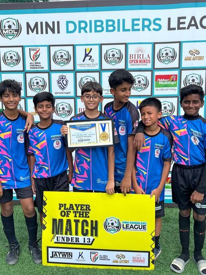 Our U13 players with their 'Player of the Match' award after a great performance. We encourage and celebrate every milestone in a player's development journey.