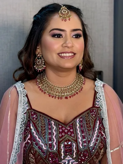Bringing out the bride's inner glow for her engagement. This soft glam look features a touch of shimmer on the eyes and radiant skin.