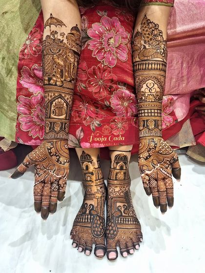 A full bridal set, including hands and feet, featuring a beautiful mix of traditional motifs like elephants, peacocks, and lotuses.
