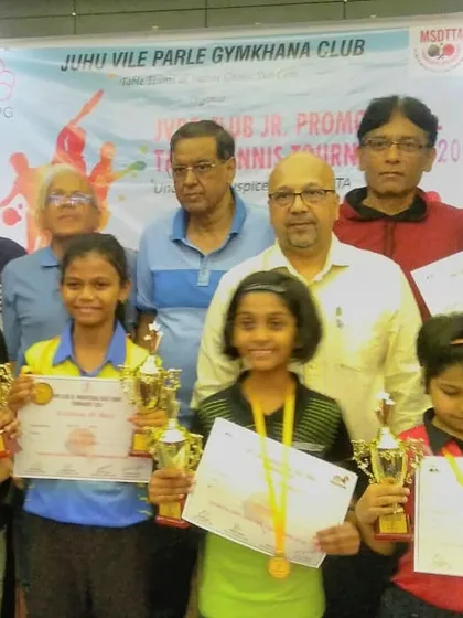 A group photo of the winners at the JVPG promotional tournament, with many of our academy's players featured prominently.