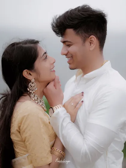 A sweet close-up of a couple, capturing their smiles and the genuine affection in their eyes.