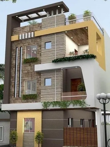 This home exterior design combines stone, textured panels, and smooth white render to create a visually rich facade. The inclusion of a rooftop terrace and integrated planters demonstrates our commitment to creating functional and green living spaces.