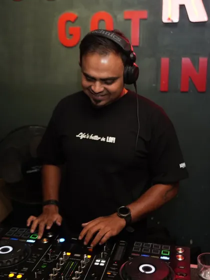 A simple, happy shot of me at the decks, wearing a "Life is better in BLR" shirt.