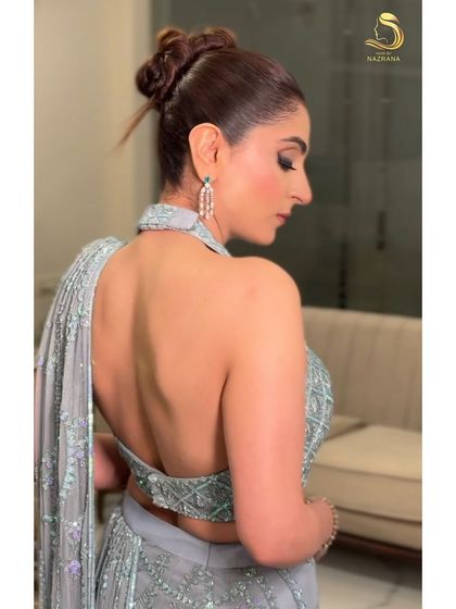 A side profile of the sleek knot bun, showcasing its clean and elegant silhouette.