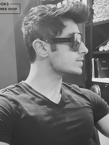 Get the look. This stylish, black and white shot captures the cool, confident vibe our clients leave with.