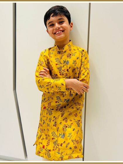 This little cutie is rocking our yellow floral kurta like a pro. It’s a cheerful and comfortable choice for any celebration.