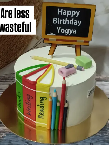 A cake for a teacher or a book lover. This design features edible books, pencils, and a chalkboard, showing that inspiration can come from anywhere.