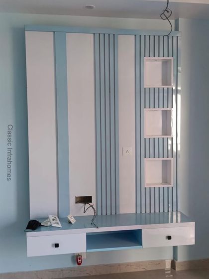 Classic Infrahomes - Turnkey Home Interior Design Elegant Living Rooms & TV Units photo 6