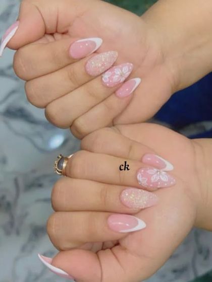 Another view of the white French set with floral and glitter accents.