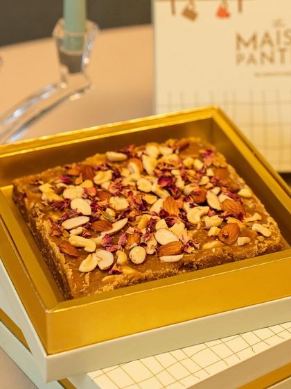 I am so excited about my handcrafted Masala Gur, made with jaggery, fine dry fruits, spices, and pure cow's ghee. It's a healthy, traditional sweet presented in elegant packaging, making it an ideal gift for the festive season.