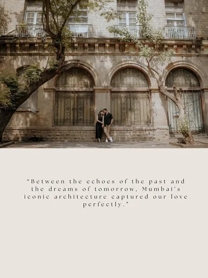 "Between the echoes of the past and the dreams of tomorrow." A romantic embrace against a stunning architectural backdrop, perfectly capturing their love story in Mumbai.