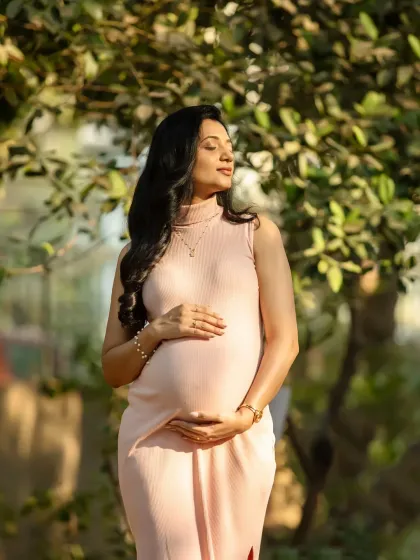 Soaking in the sunshine and that beautiful pregnancy glow. This solo outdoor portrait is all about celebrating you. The soft, natural light makes these moments feel so serene and magical.