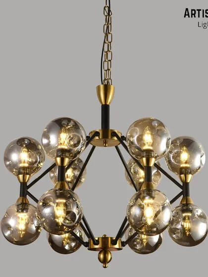 A radial pendant light in an industrial vintage style. The wrought iron chandelier with individual glass shades offers a rugged yet refined look, perfect for lofts or modern farmhouse interiors.