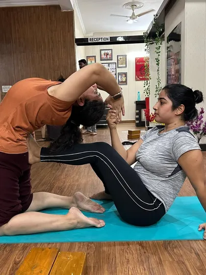 This partner backbend is a beautiful expression of mutual support and flexibility. One partner provides a stable base while the other explores a deep heart-opening stretch.