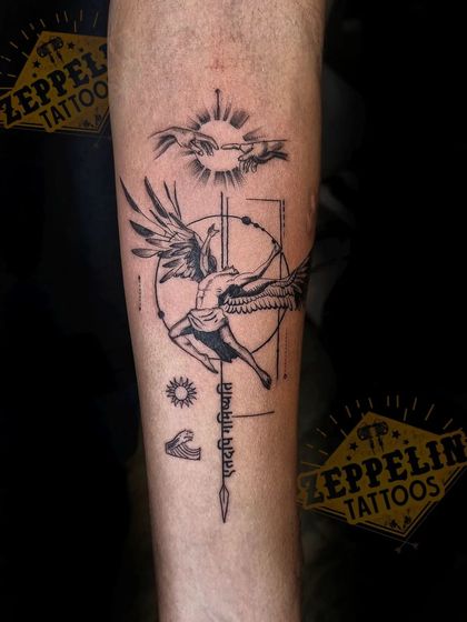 A custom tattoo featuring the Sanskrit phrase "Etadapi Gamishyati" (this too shall pass). The design incorporates Icarus and the Creation of Adam hands, symbolizing the transient nature of highs and lows.